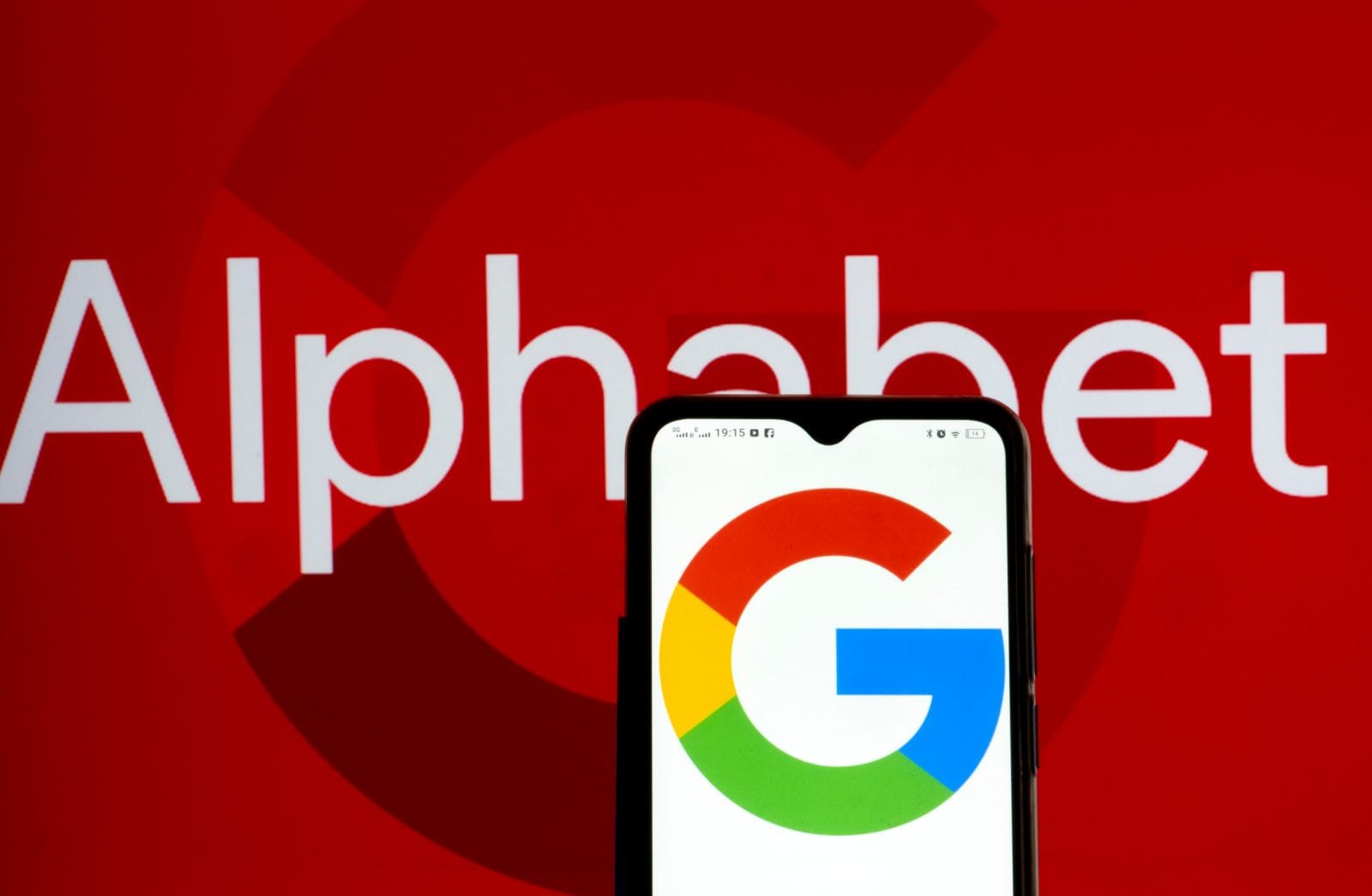 Alphabet Inc_ and Google logos seen displayed on a smartphone by IgorGolovniov via Shutterstock