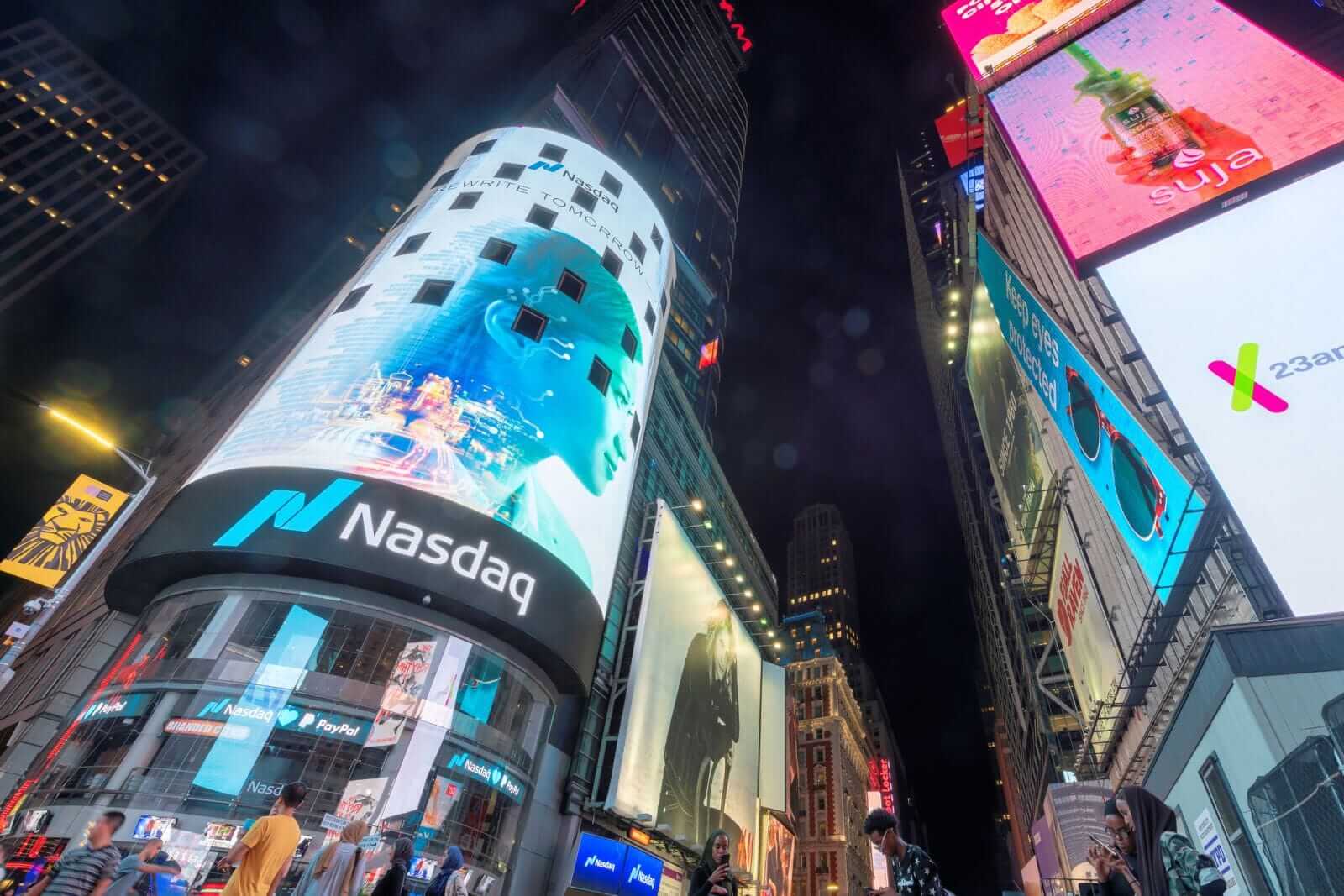 NASDAQ sign at times square at night by Lucky-photographer via iStock
